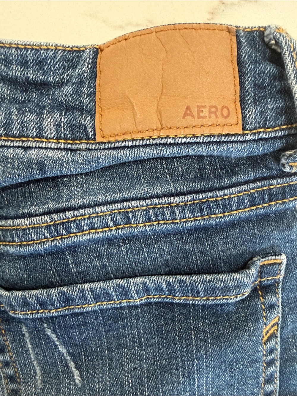 AERO Women's Dark Blue Distressed Rolled Cuff Denim Shorts - Picture 4 of 5